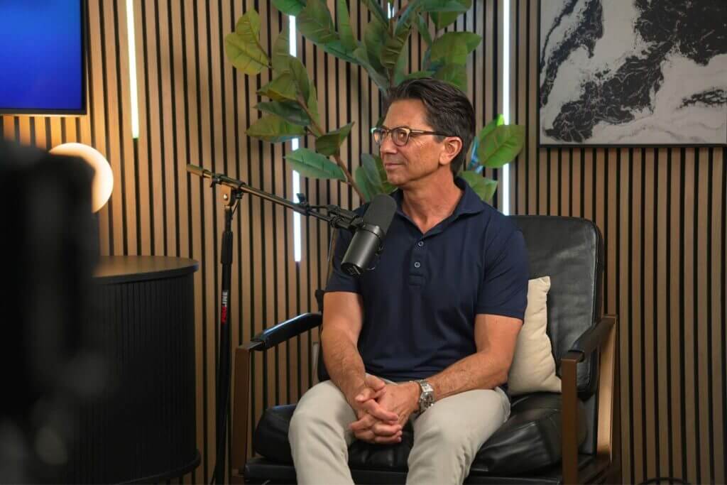 Client filming a podcast style interview in the studio